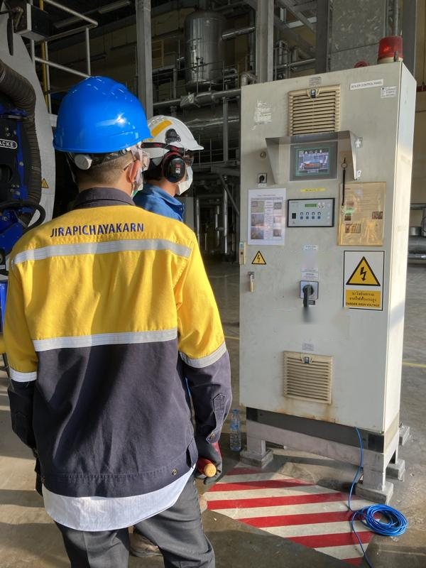 JPK engineer checking a boiler control panel